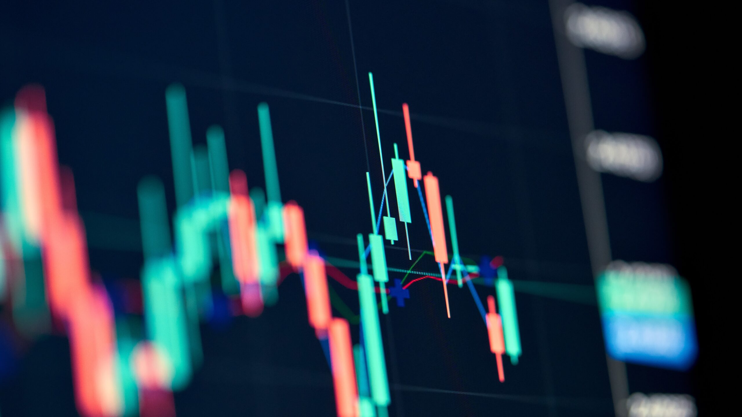 Close-up view of a forex trading chart showing candlestick patterns and market trends, illustrating strategies for achieving a 50% win rate in forex trading on VT Markets.